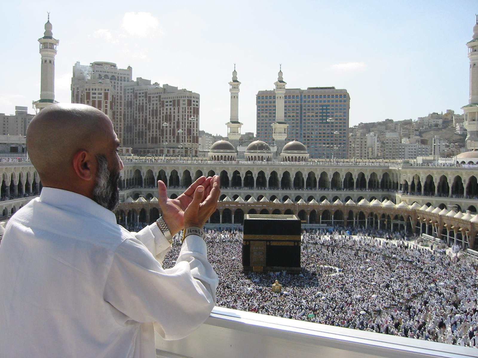 A pilgrim supplicating at the Masjid al-Haram, Mecca